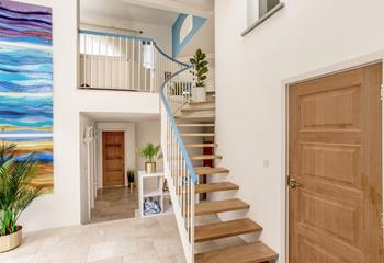 Climb the stairs to the open plan living area in this reverse-level house.