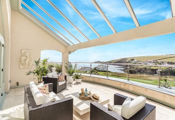 The large balcony offers stunning views of Portmellon and beyond.