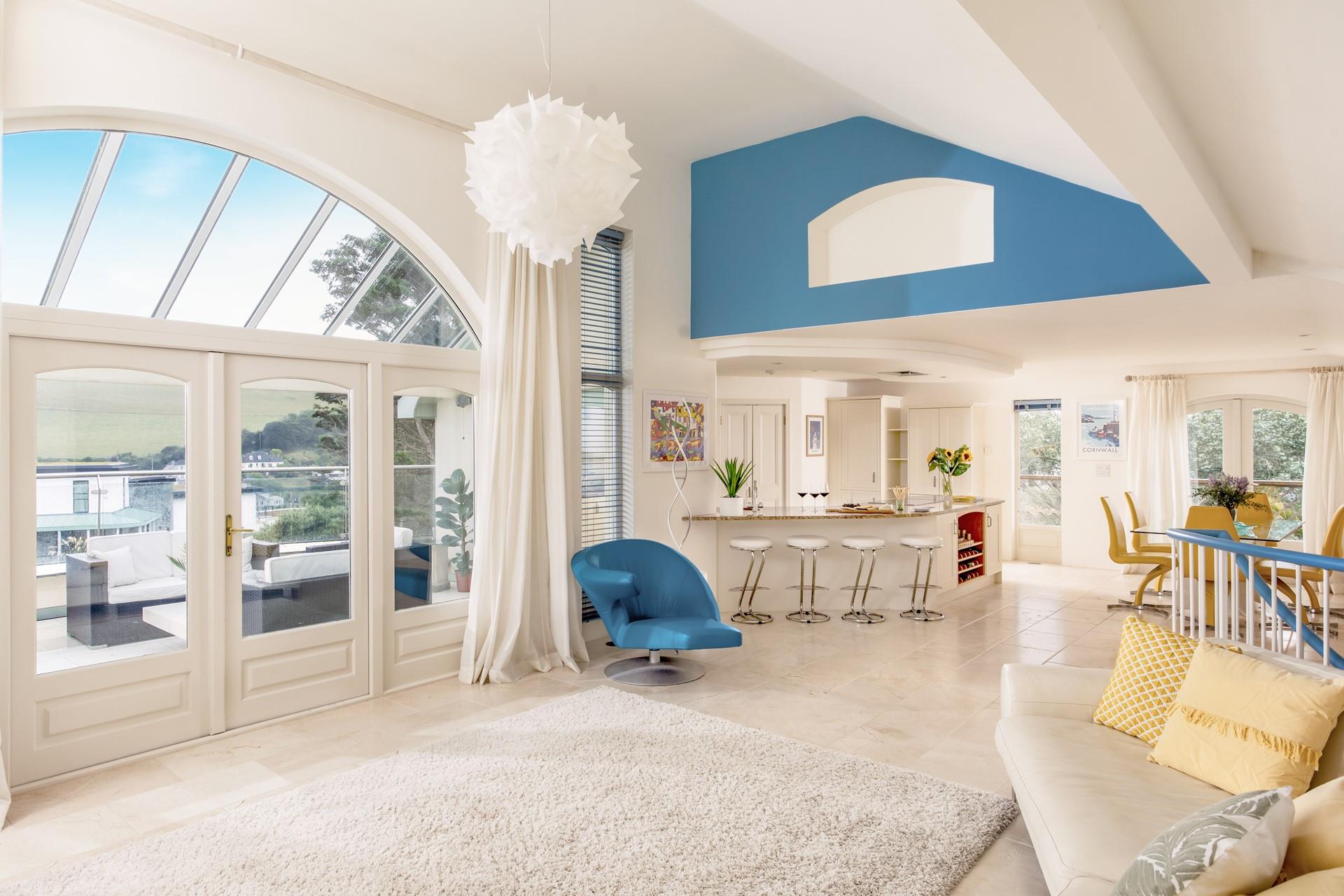 The open plan living space is perfect for spending quality time together as a family.