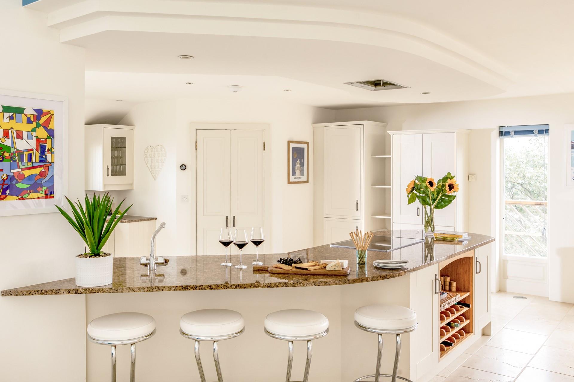 Pour yourself a glass of wine to take out on the balcony and enjoy some nibbles with a view.