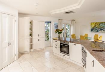 The kitchen is spacious with all the appliances you need to cook up a storm.