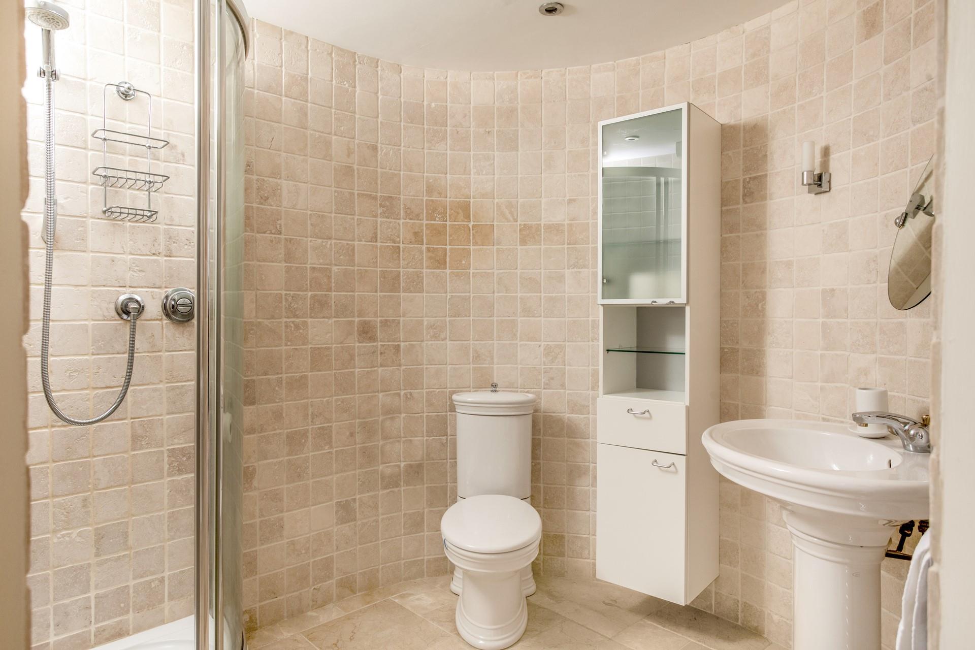 Wander into the spacious en suite and get ready for a day out.
