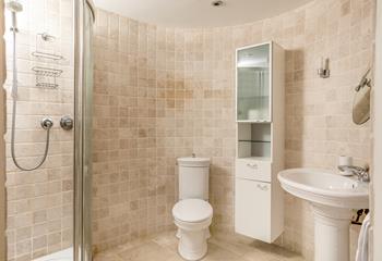 Wander into the spacious en suite and get ready for a day out.
