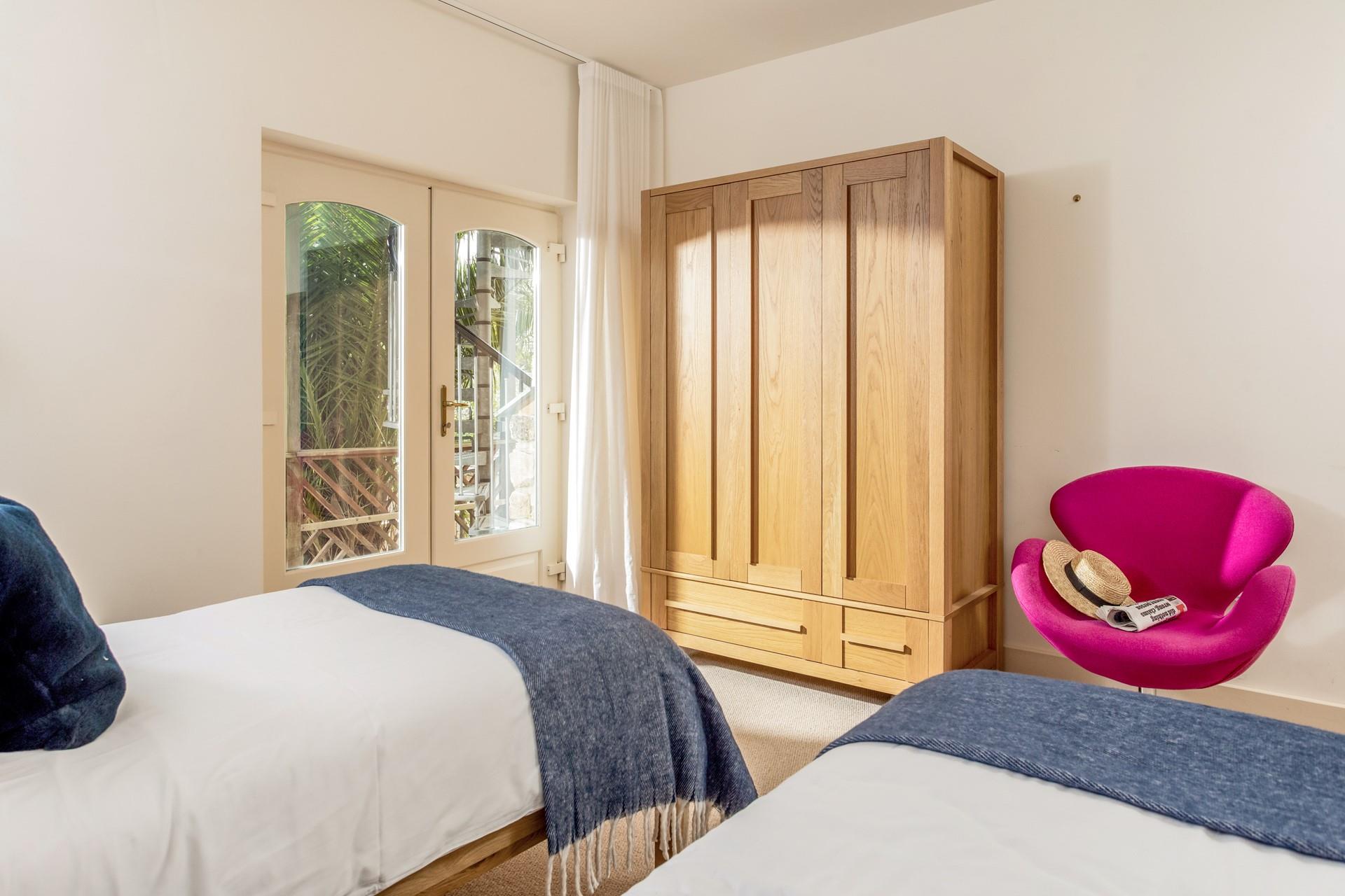 The twin beds are perfect for young adults or children.