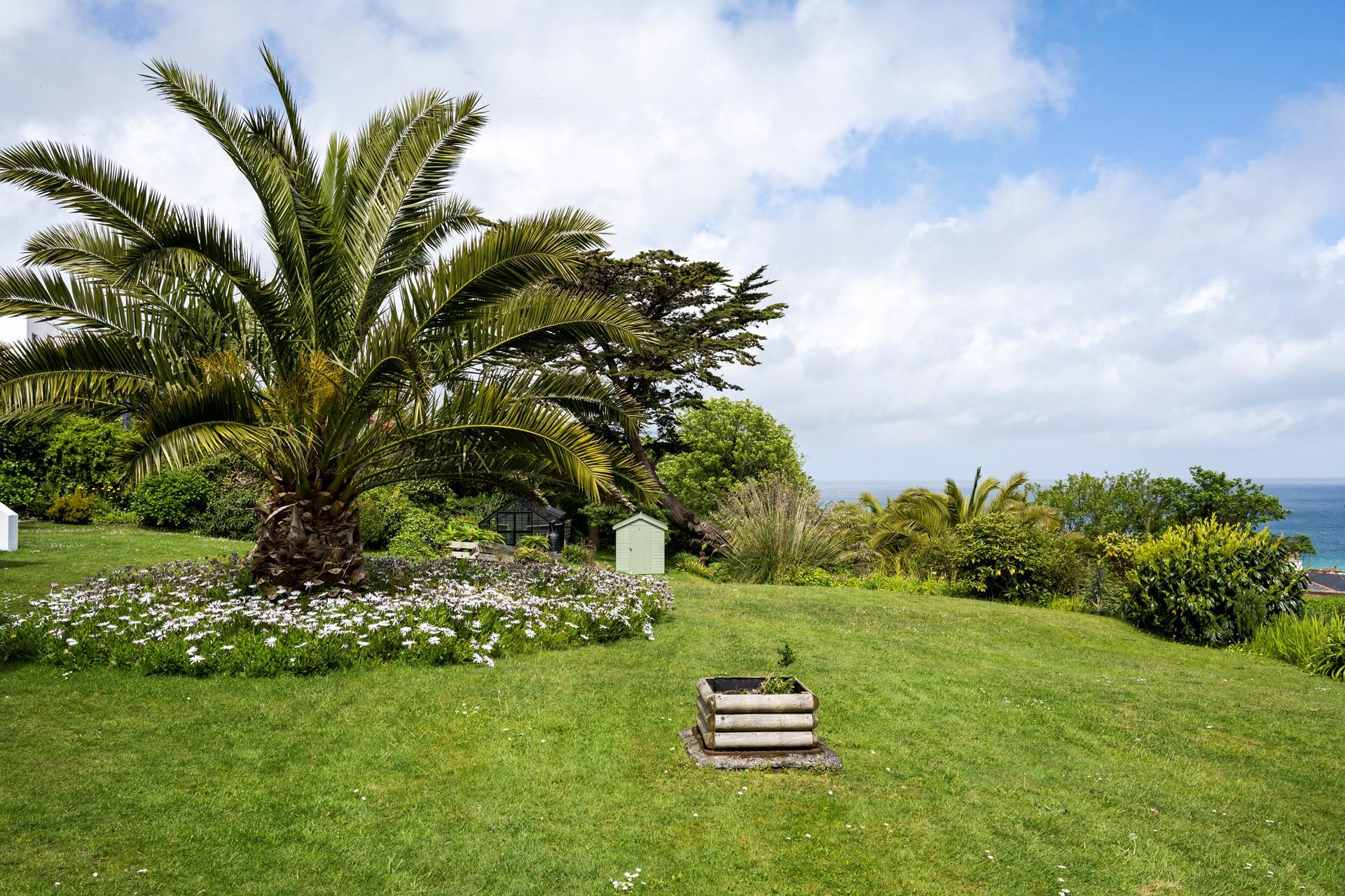 Spend time with your loved ones in the sea view garden.