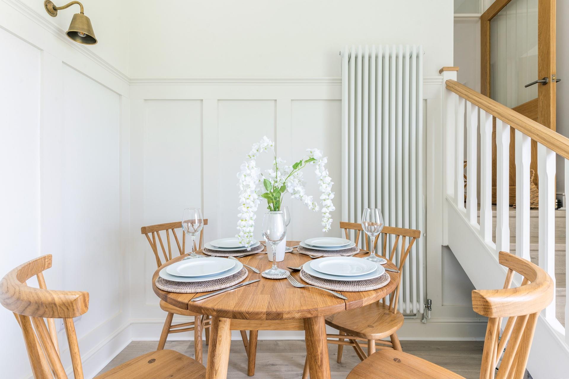 Tuck into a tasty meal around the table filled with fresh local ingredients.