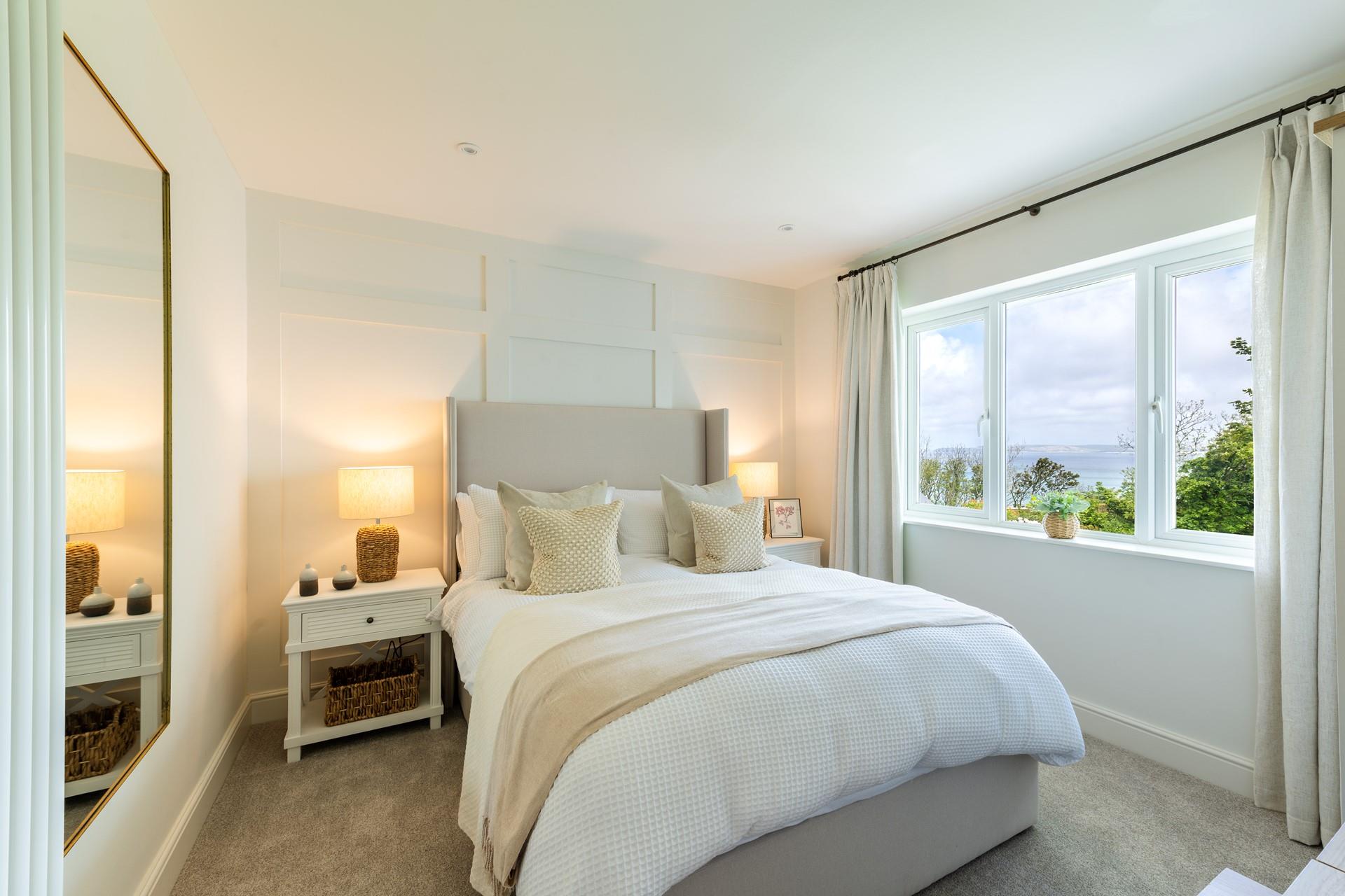 The bedrooms are stylishly decorated with calming pastel hues.