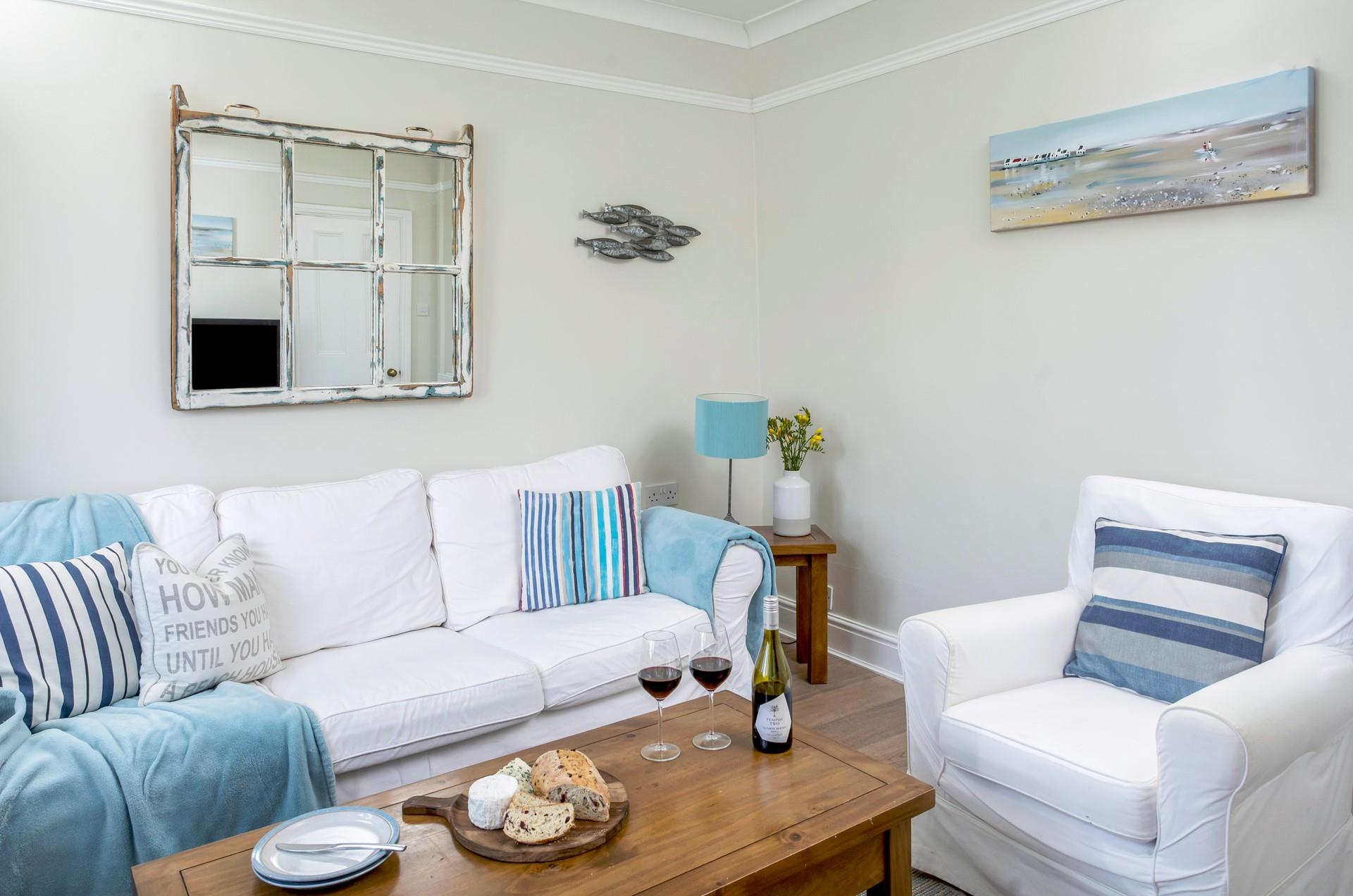 Tuck into a tasty platter of cheese washed down perfectly with a glass of wine.