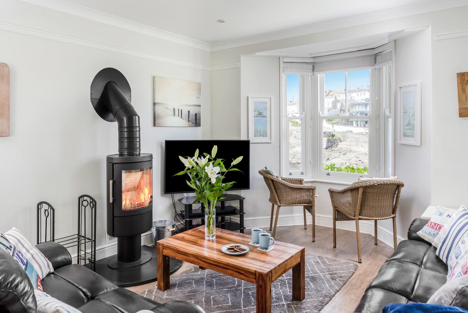 The sitting room is comfortable and light, the perfect spot to relax after long days of exploring.