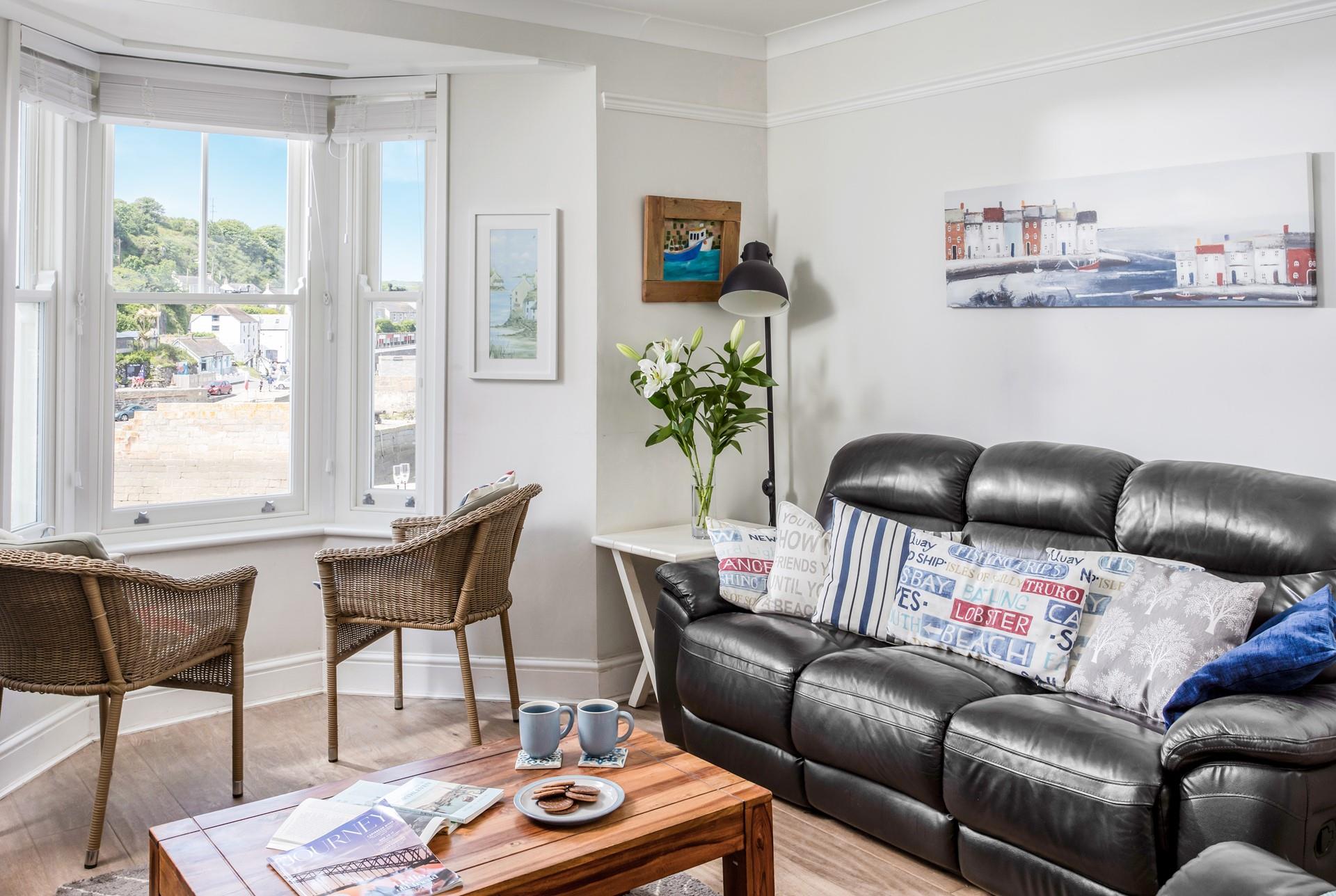 Watch the comings and goings in the harbour from the window seat.