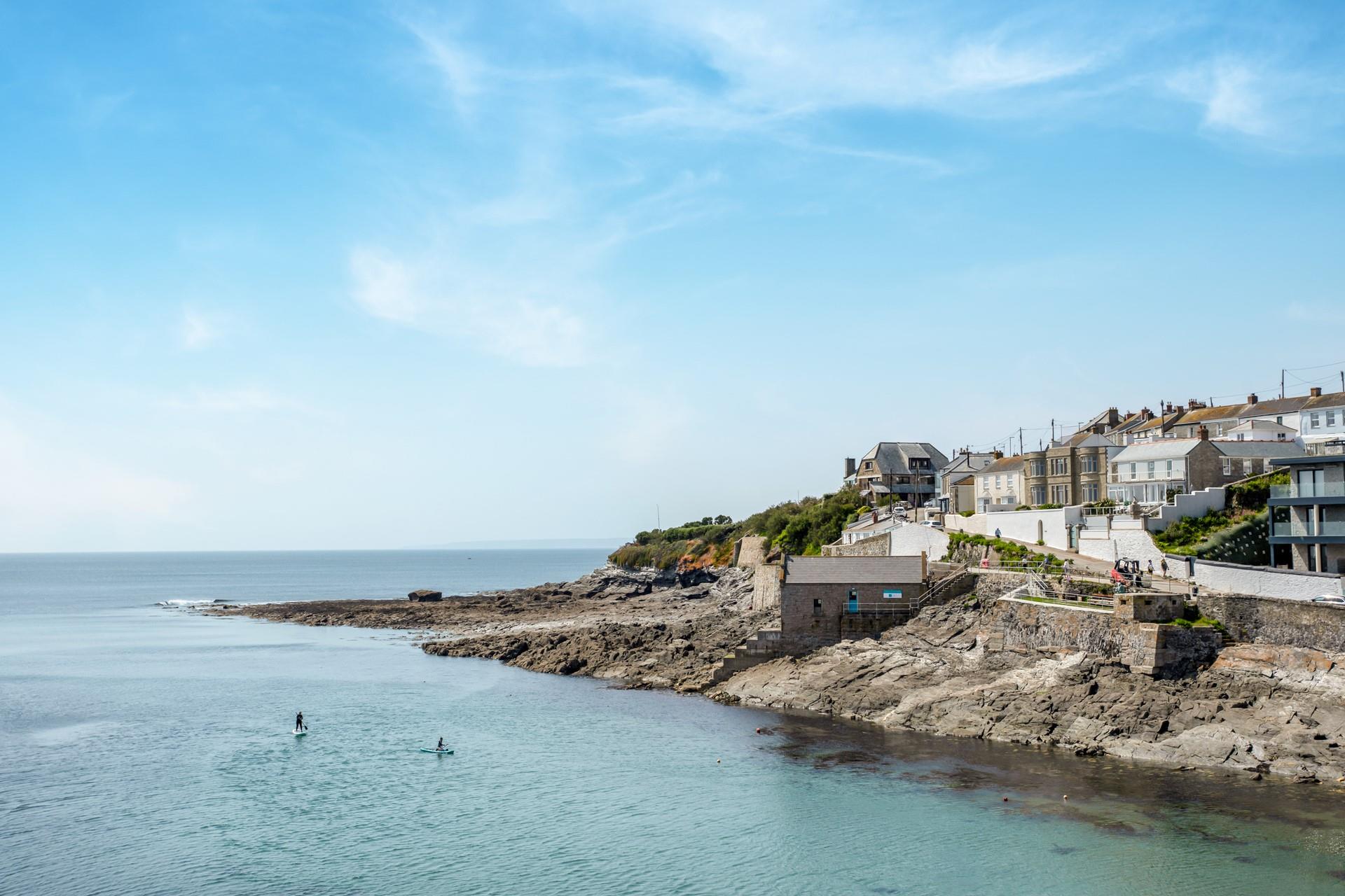 The harbour is perfect for learning watersports such as paddleboarding.