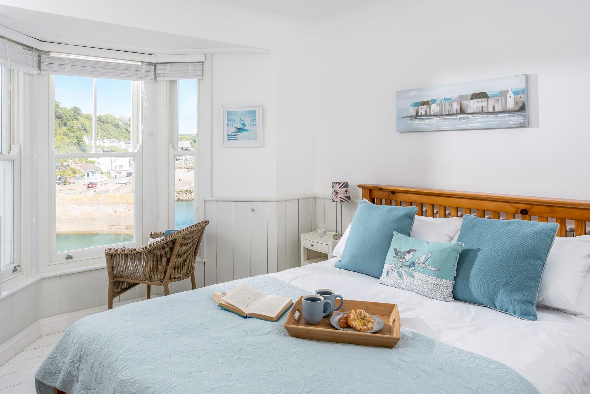 The spacious king size bed offers a sumptuous night's sleep.