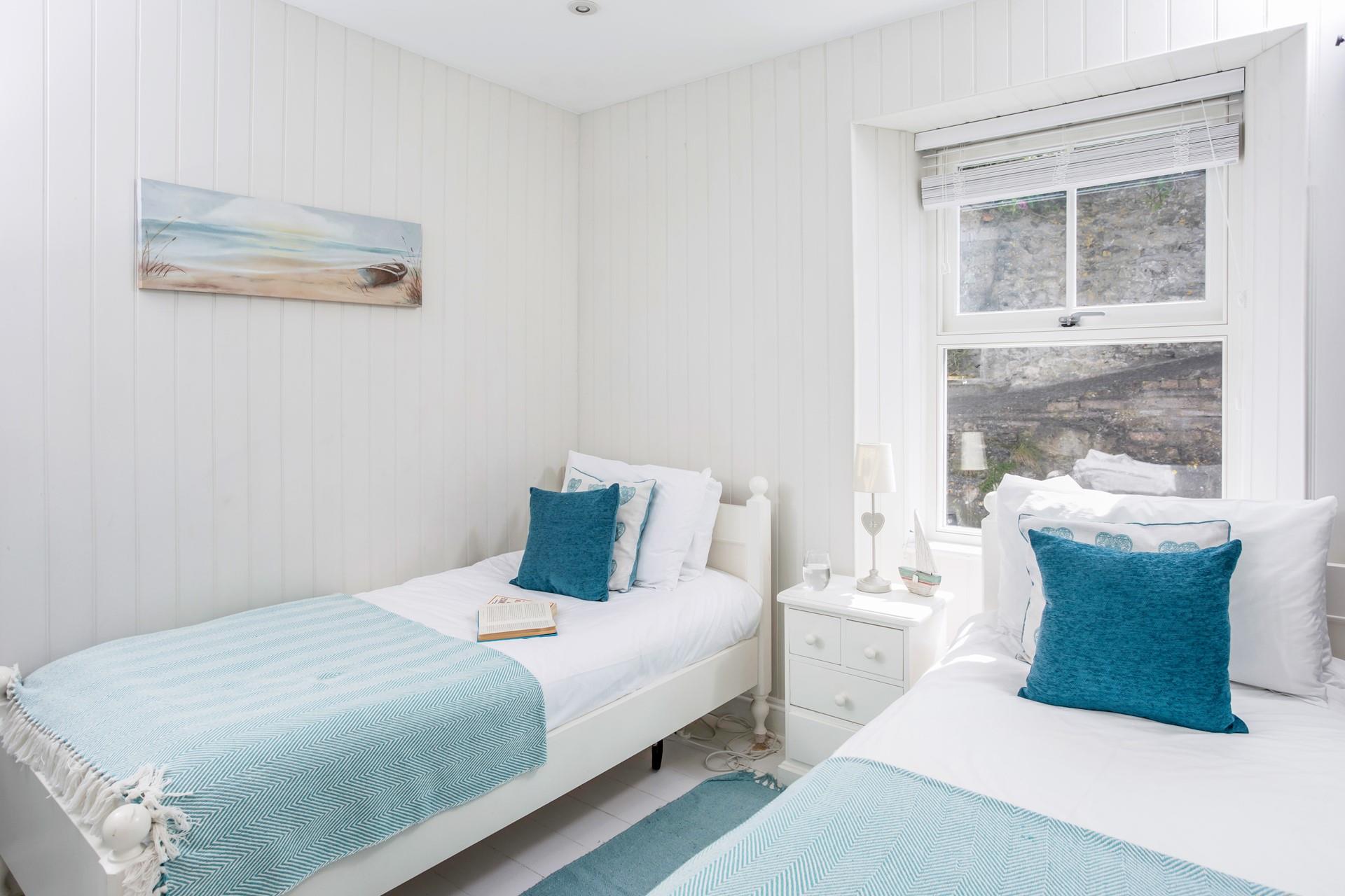 The twin beds in bedroom 3 are perfect for children or adults.