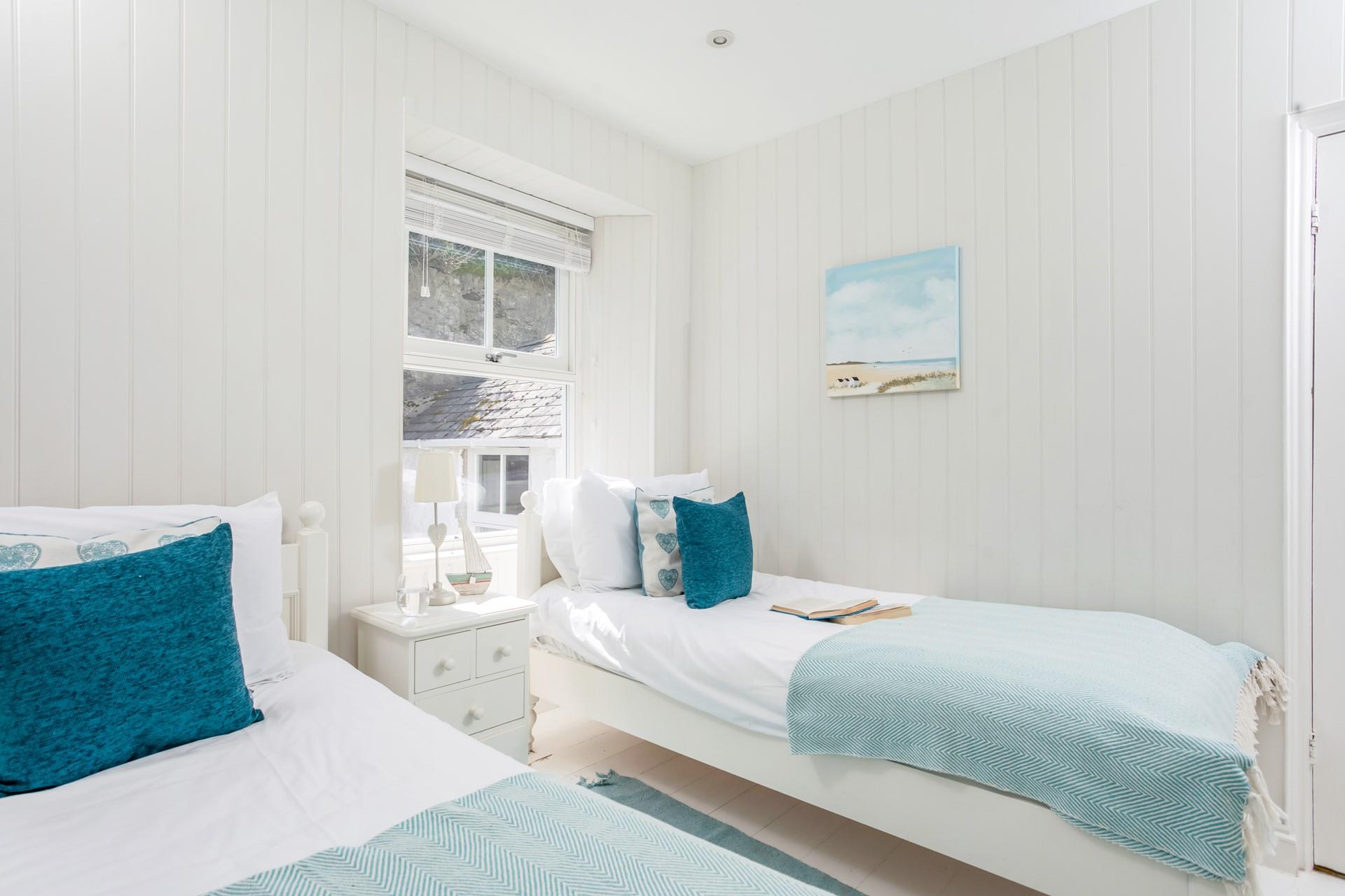 Stylishly decorated, the bedrooms all reflect the seaside location.