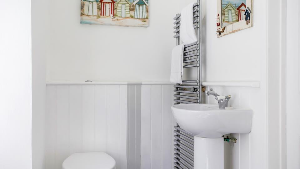 Step out of the shower to warm fluffy towels from the heated rail.