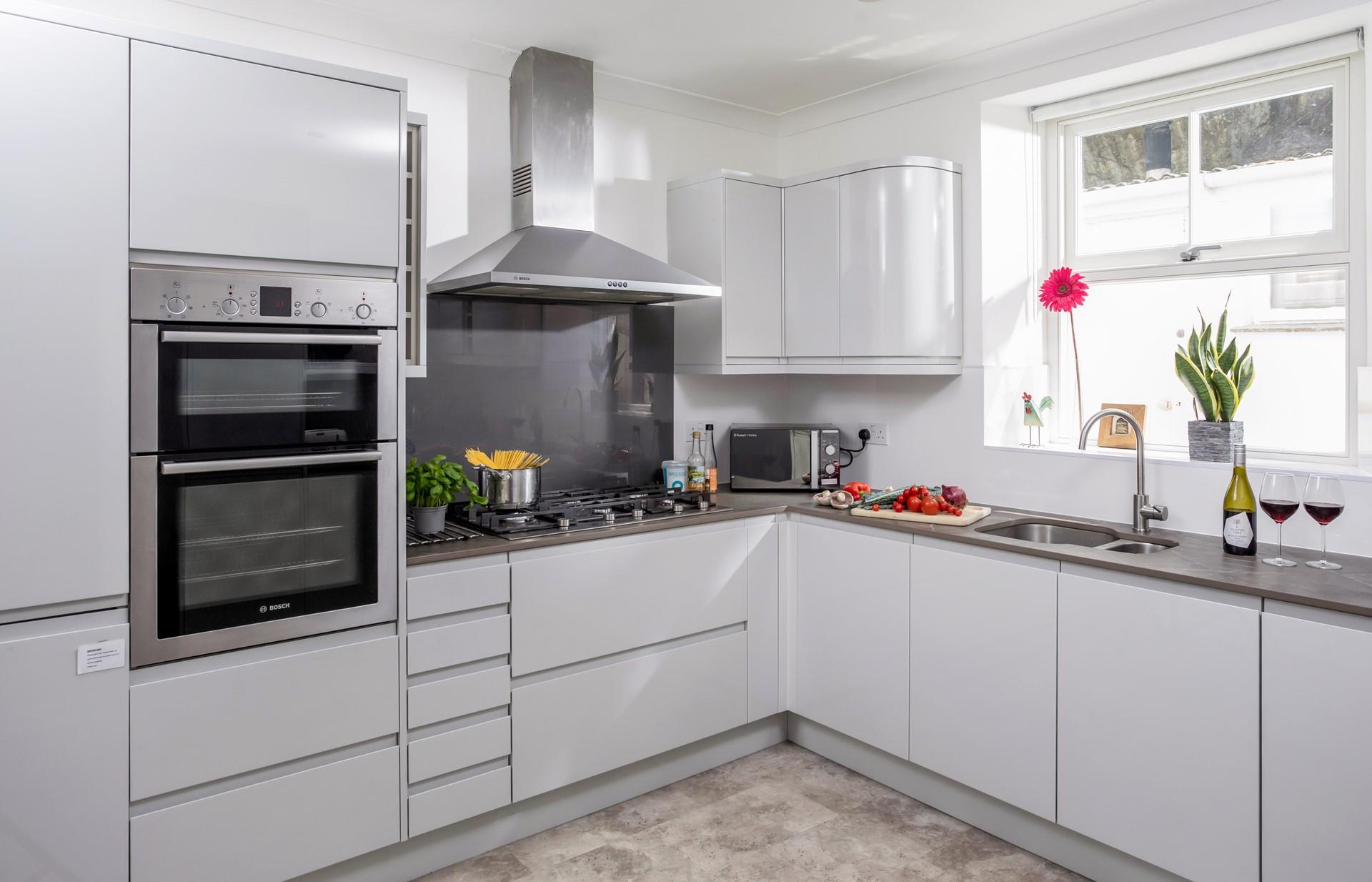 The kitchen is fully equipped for cooking tasty meals for the whole family.