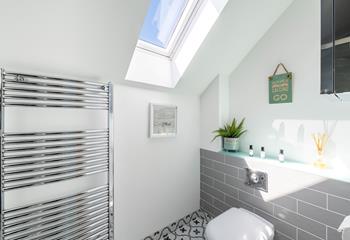 Get ready for the day in the modern en suite.