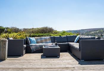 The stylish rattan furniture is perfect for al fresco nights sipping your favourite wine.