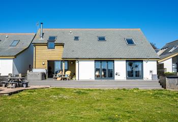 The little ones will love playing on the front lawn while you watch from the decking.