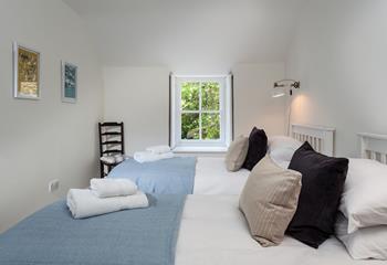 Bedroom 2 has sumptuous twin beds for sinking into after busy days.