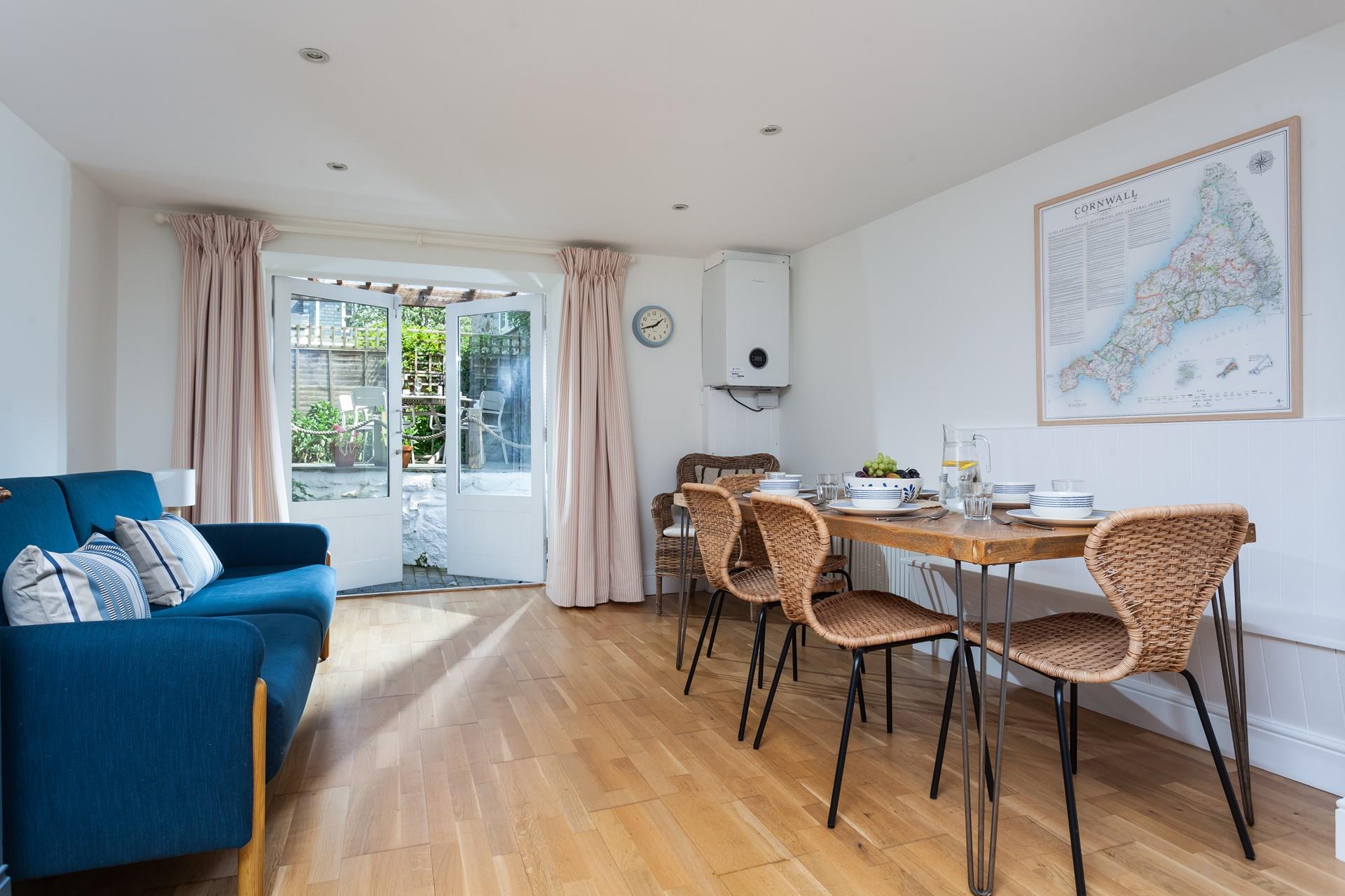 Sit around the stylish dining table and tuck into a tasty meal full of fresh produce.