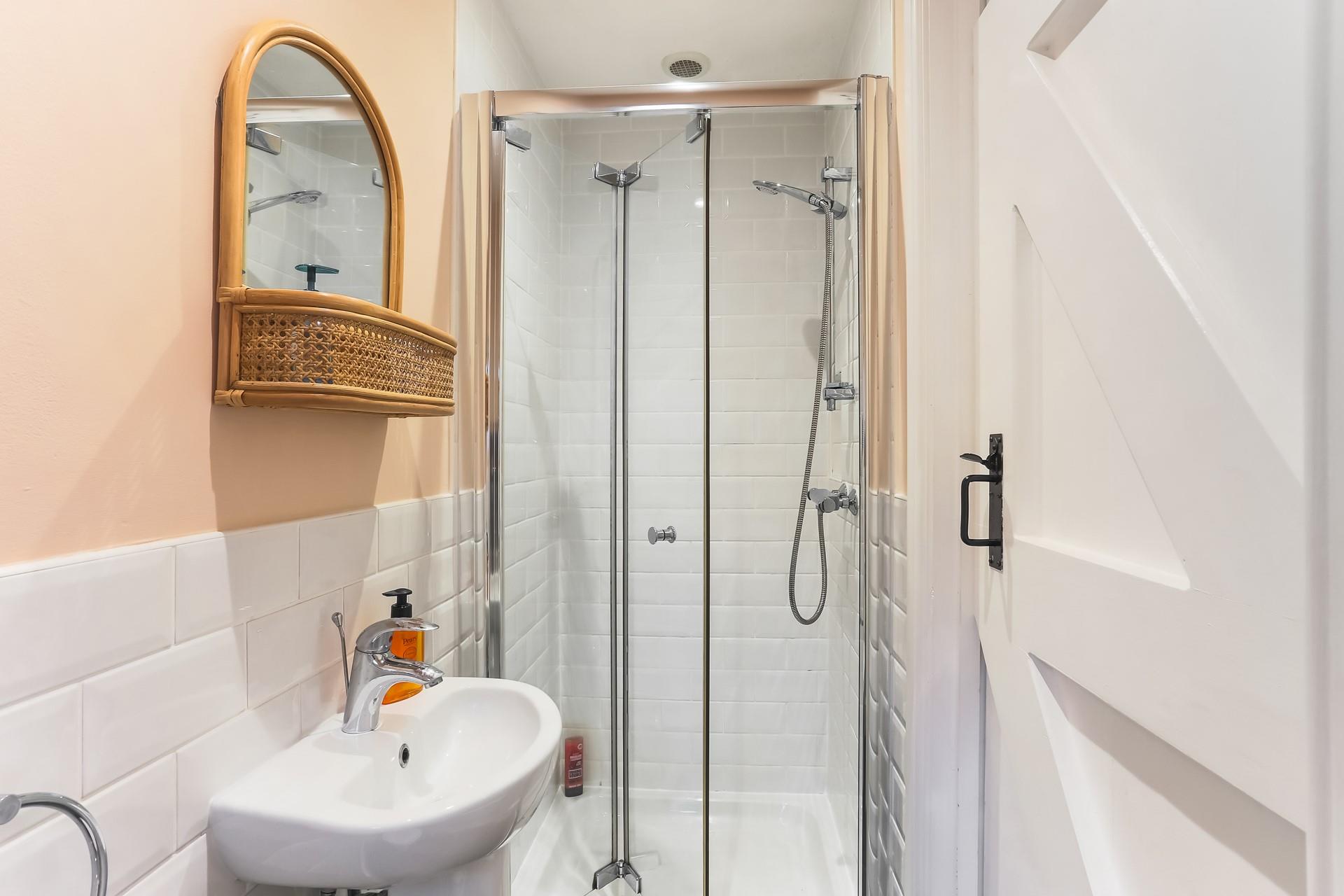 Freshen up in the modern shower room after a day on the beach.