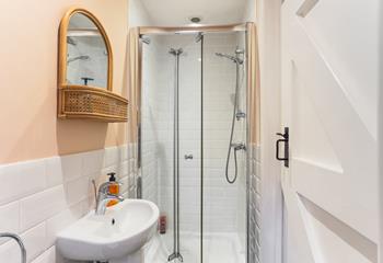 Freshen up in the modern shower room after a day on the beach.