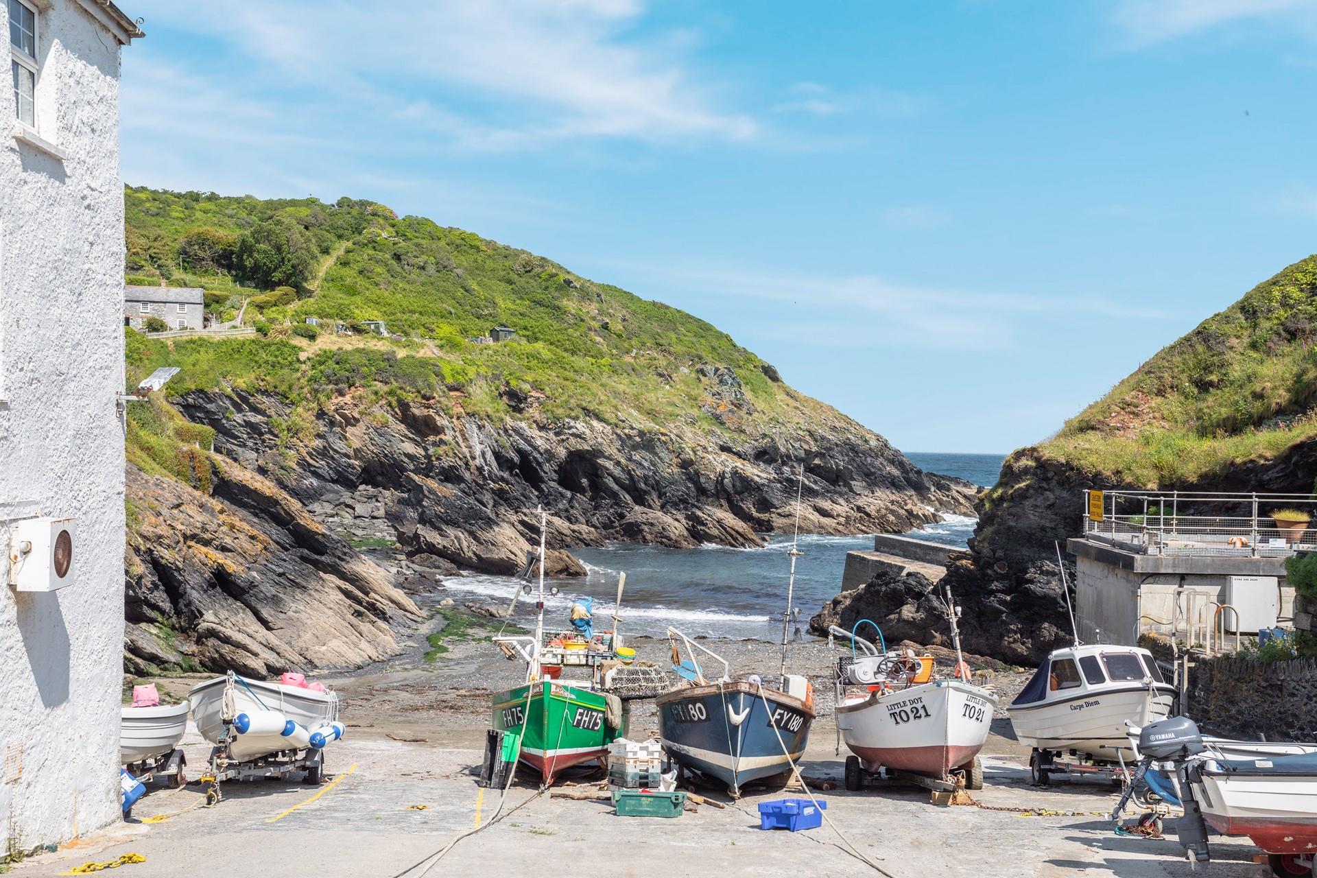 The charming cove of Portloe is perfect for a midday dip and sunbathing.