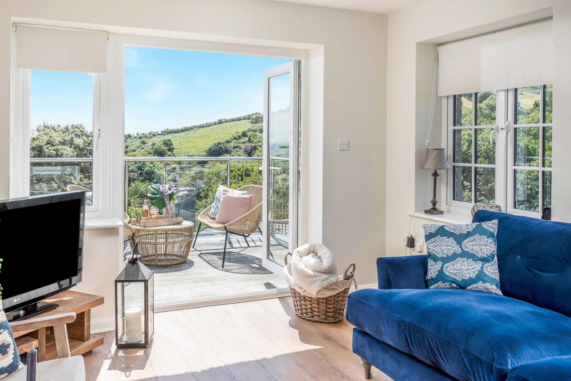 Cuddle up under the blankets and watch the sun come down over the balcony.