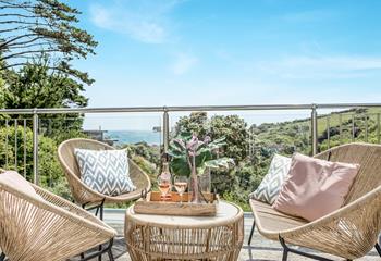 Pour a glass of your favourite wine and soak up the sun and views on the balcony.