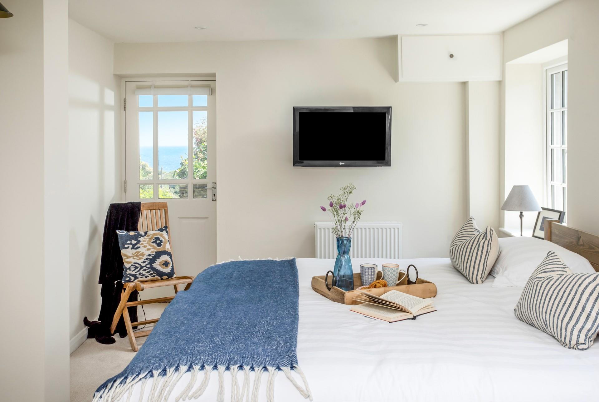 The luxurious super king size bed offers a comfortable night's slumber.