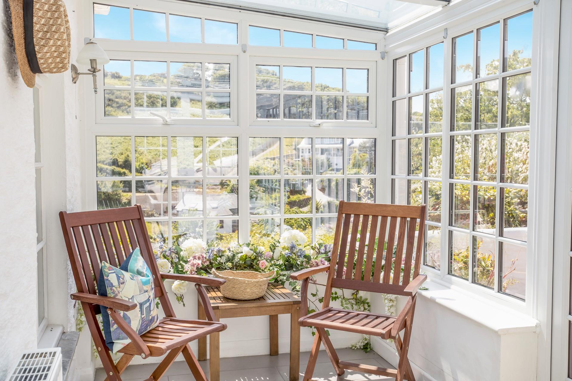 Sit with a cuppa in the conservatory as the day wakes.