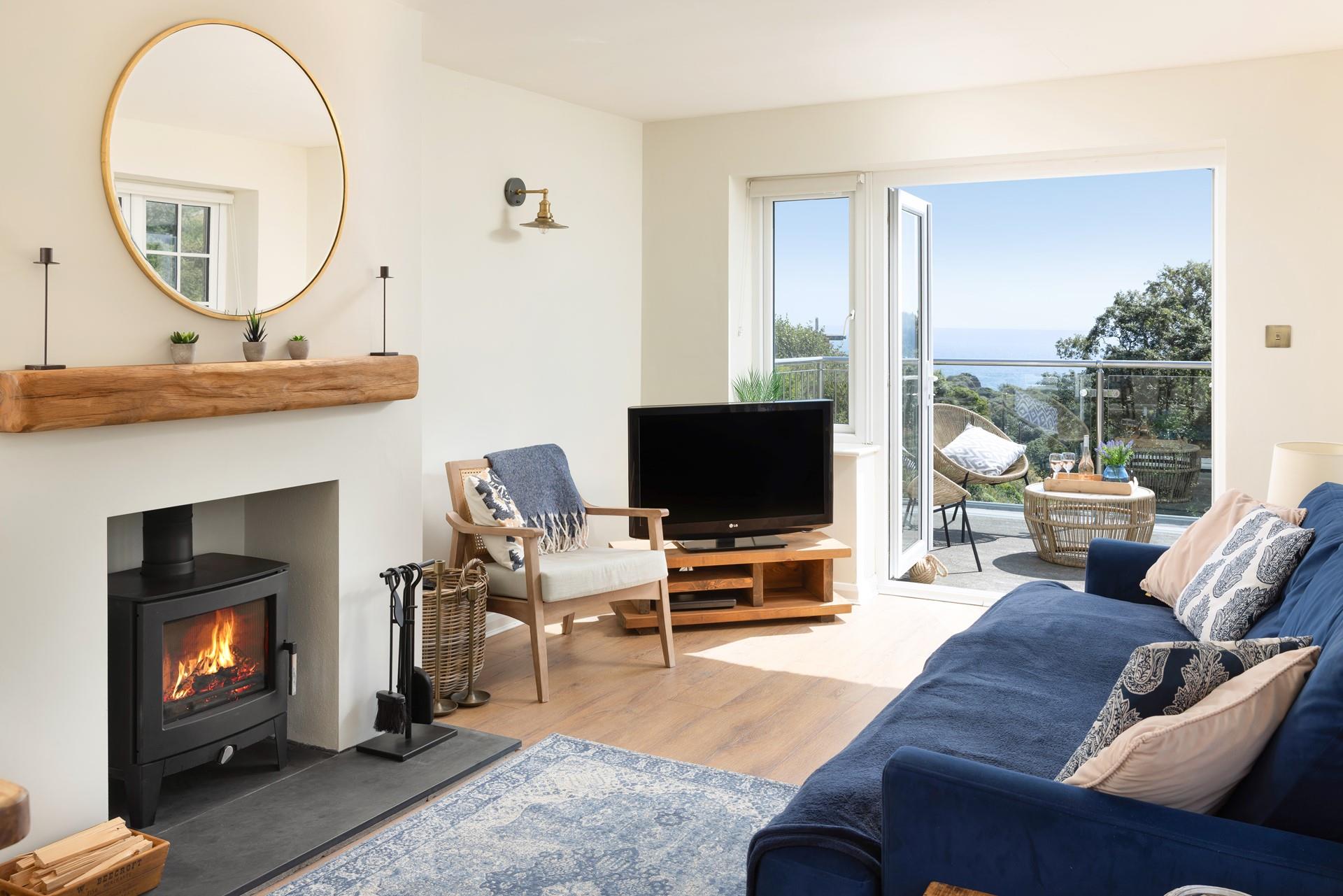 Sink into the plush sofa, listening to the sounds of the sea.