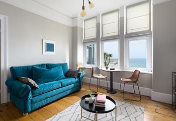 Put your feet up in the cosy sitting room and enjoy the stunning sea views.