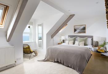 Bedroom 2 also has a luxurious king size bed and far-reaching views across St Ives harbour.