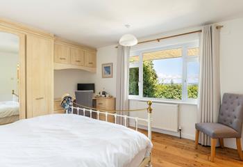 Wake up to the countryside views in the spacious king size bed.