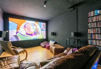 Enjoy the ultimate movie night in the cinema room!