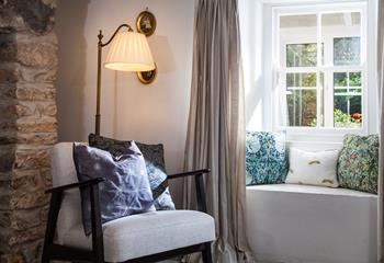 The window seat is the perfect spot for a spot of peace and quiet after a day out.