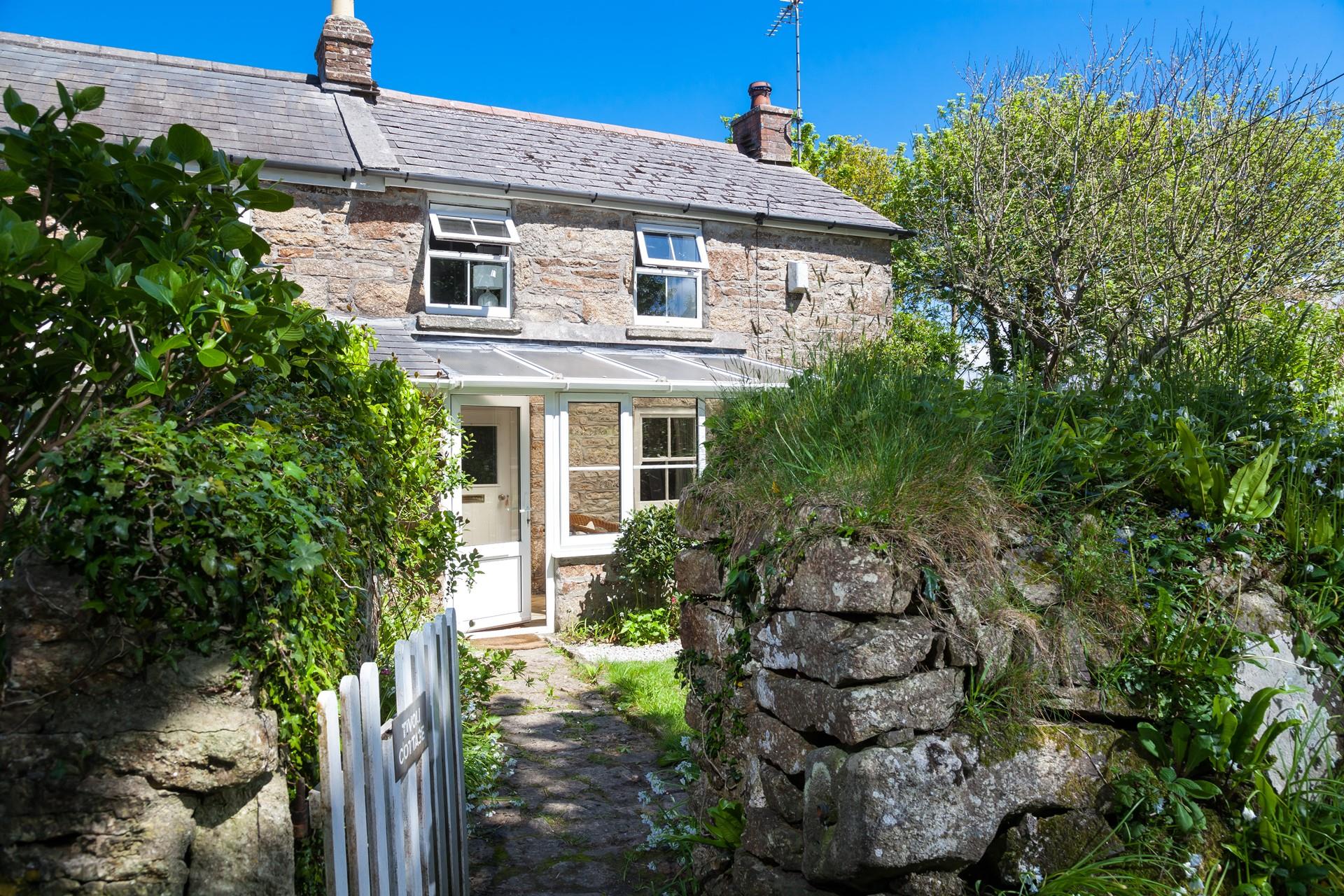 Step through the gate and up the cottage garden path to start the holiday.