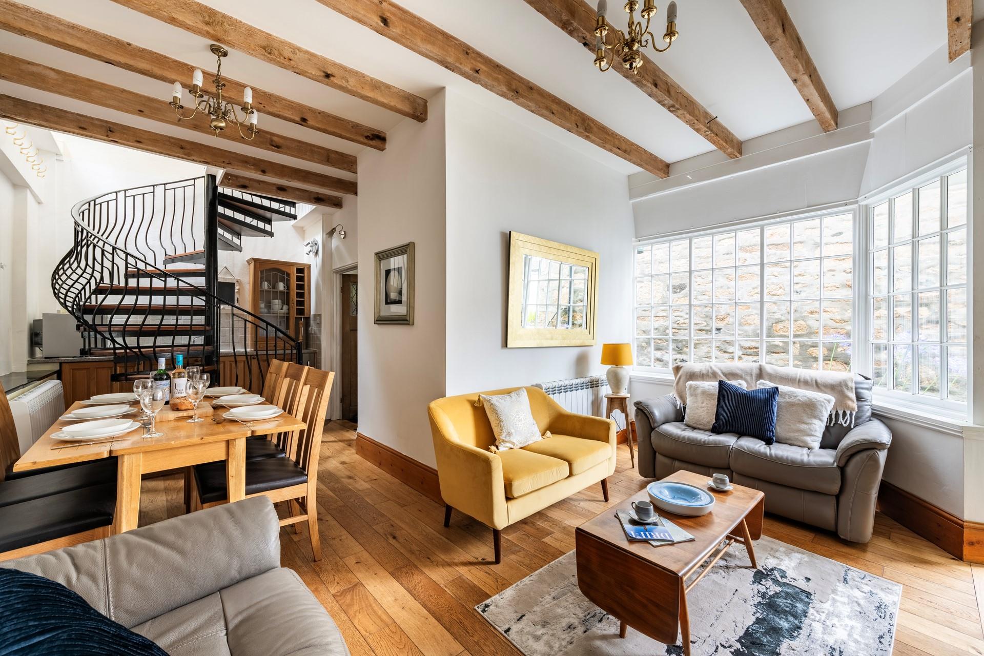 The open plan living space is perfect for spending quality time as a family.