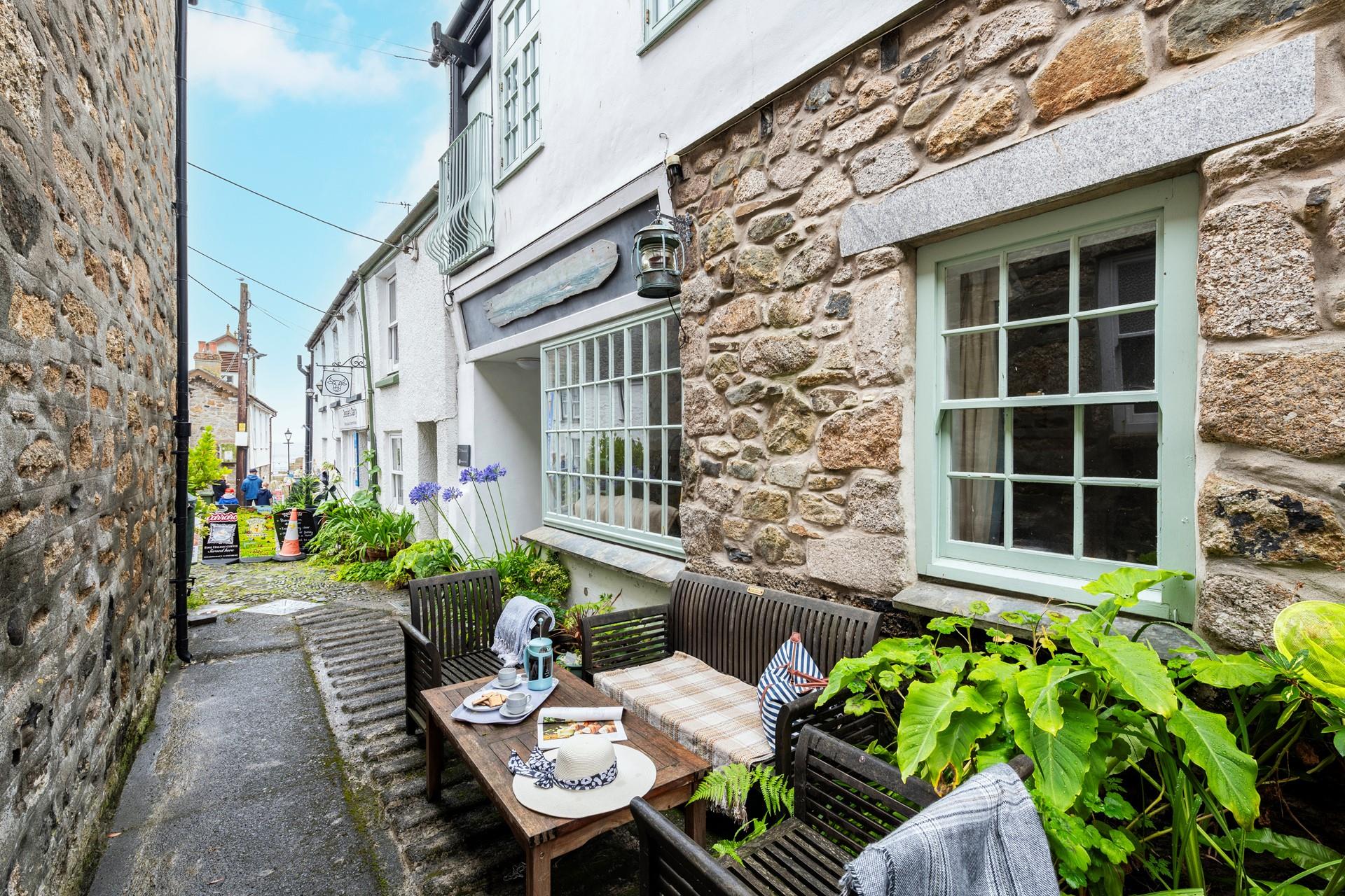 Take your morning cuppa outside on the terrace to start the day.
