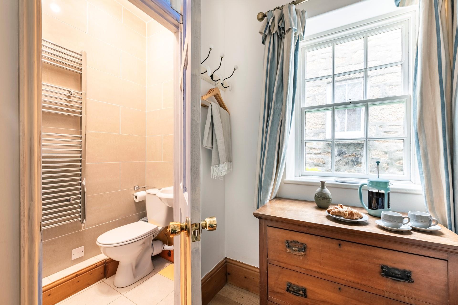 Bedroom 1 has an en suite shower room for getting ready each day.