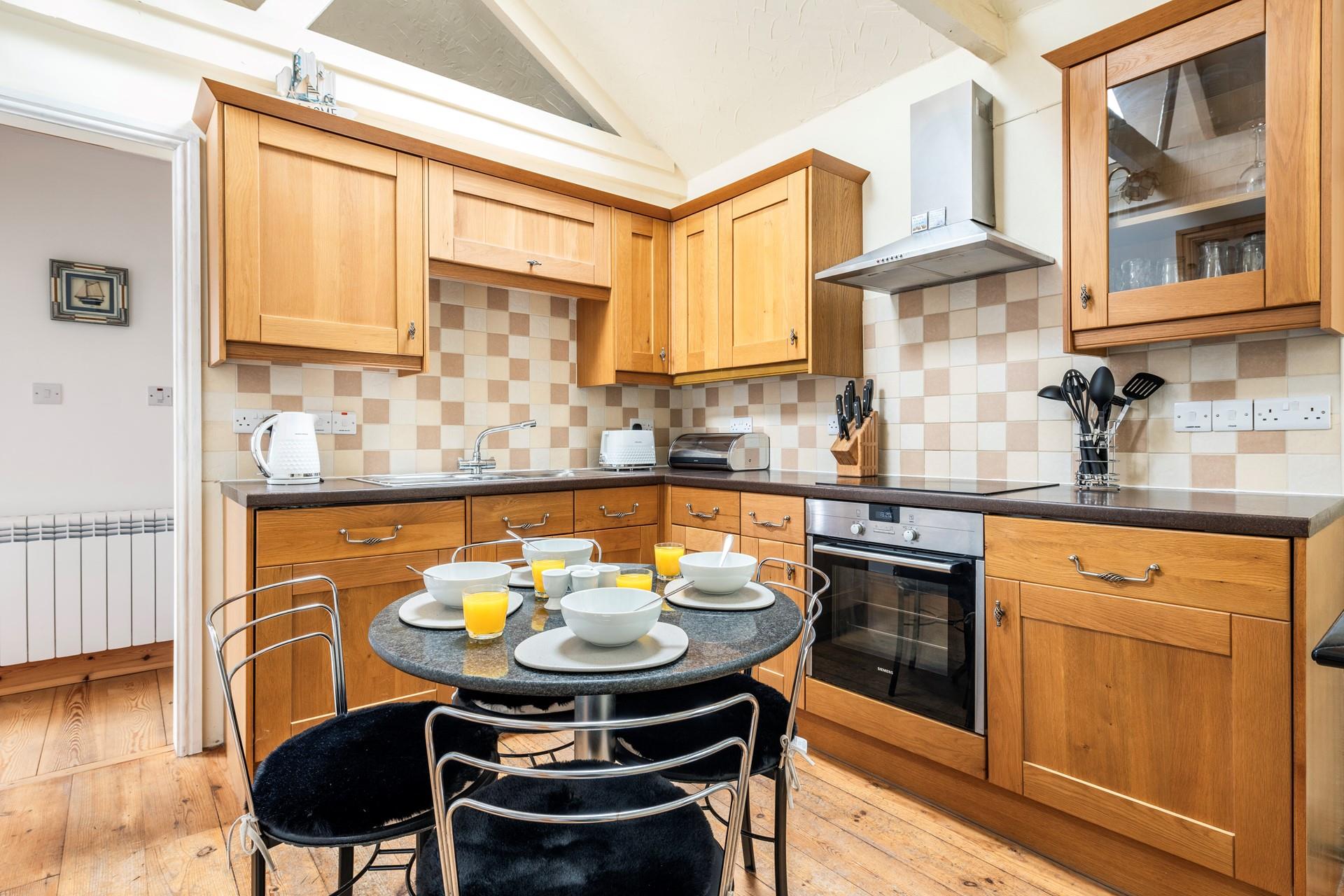 The kitchen is well-equipped for cooking tasty meals.