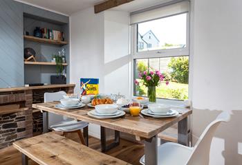 Gather round the dining table and plan your day over a delicious breakfast.