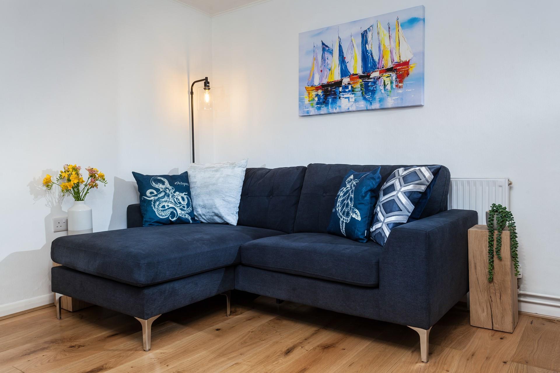 A cosy corner, perfect for curling up with a book and cuppa.