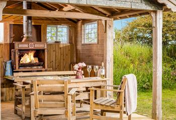 There is an additional woodburner outside where you can enjoy meals with it roaring in the background.
