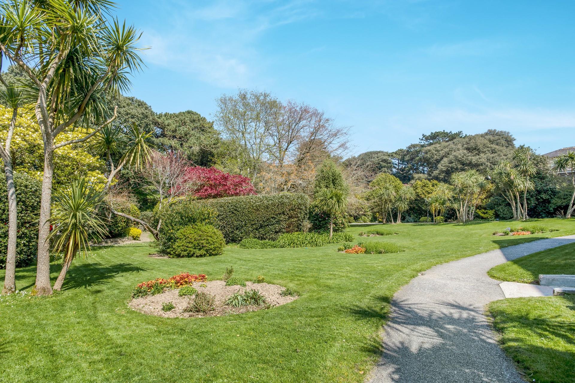 Take a morning stroll through the gardens in the sunshine.