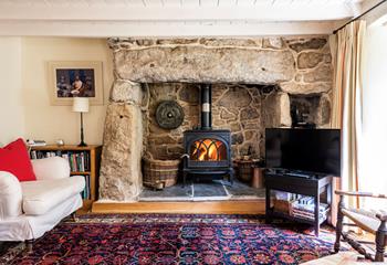The beautiful feature fireplace makes The Farmhouse perfect for a Cornish getaway in all seasons.