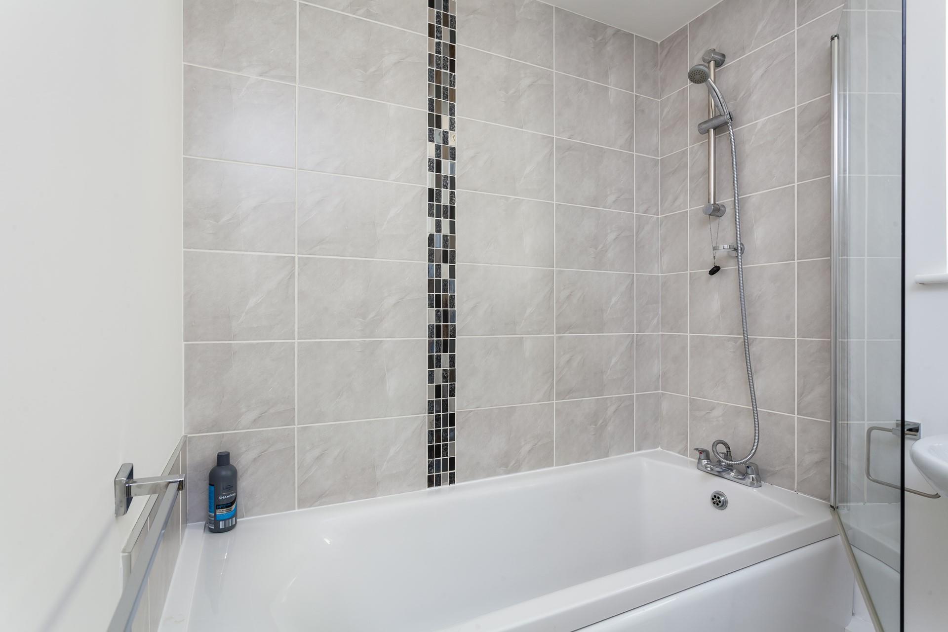 Wash off sandy toes in the shower before heading out to enjoy a meal locally.