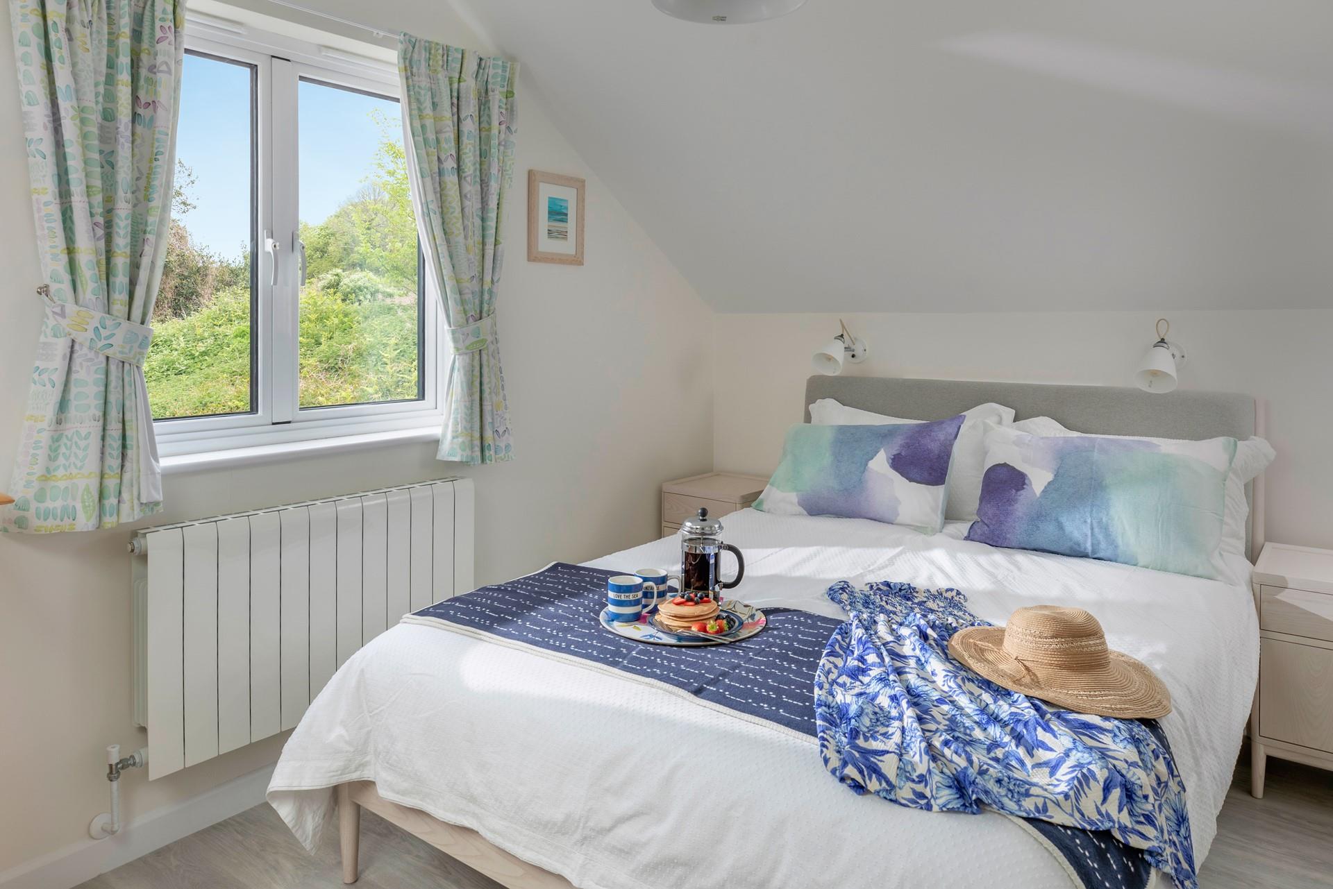 Settle into the soft sheets of the king size bed and drift off to sleep.